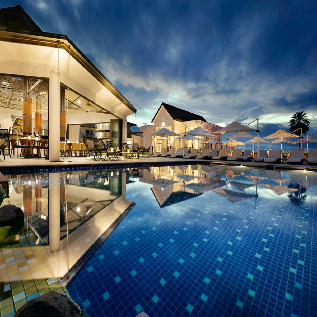 Row of loungers at a beachfront hotel