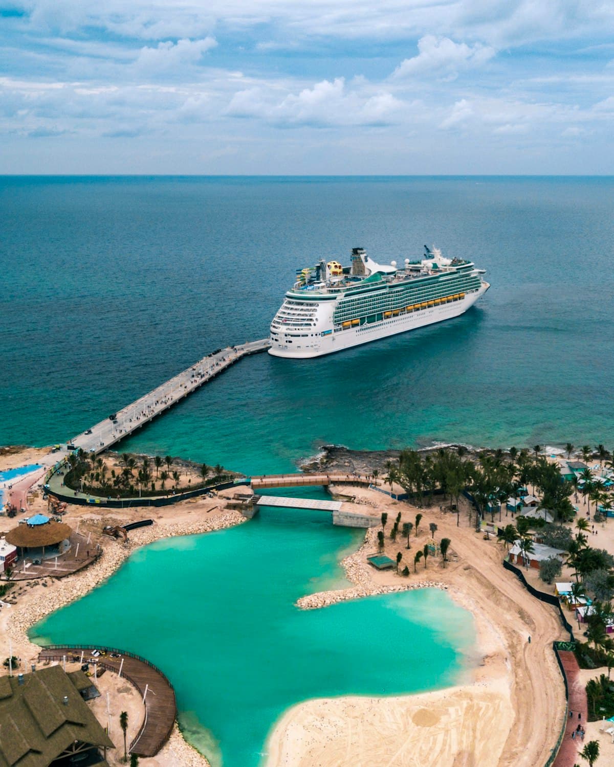 Cruise ship anchored near a tropical island